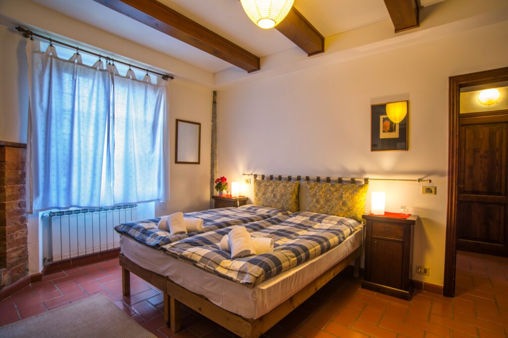 Slaapkamer op de stal voor de paardrijvakanties in Italië