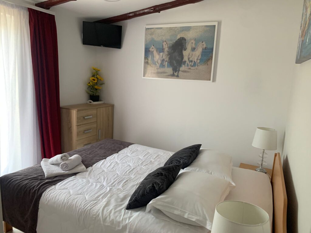 Slaapkamer tijdens de paardrijvakantie in Kroatië.